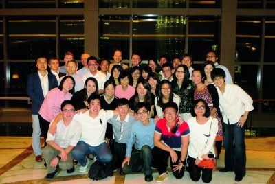 Tim Howell (in background) with colleagues in KL